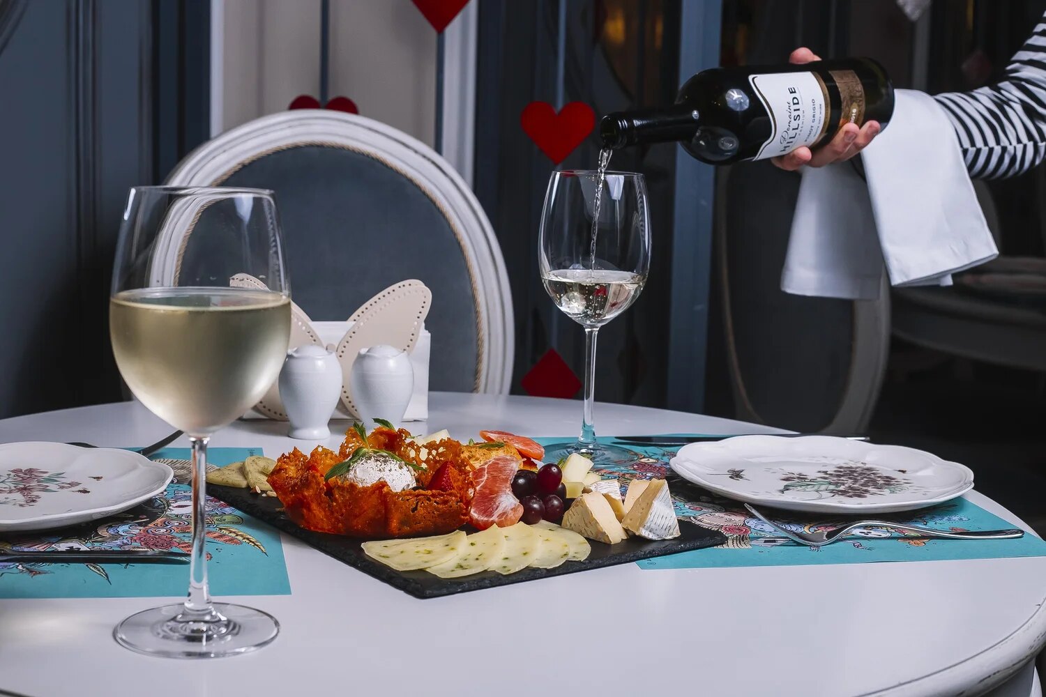 Elegant private event table with catered food and wine service