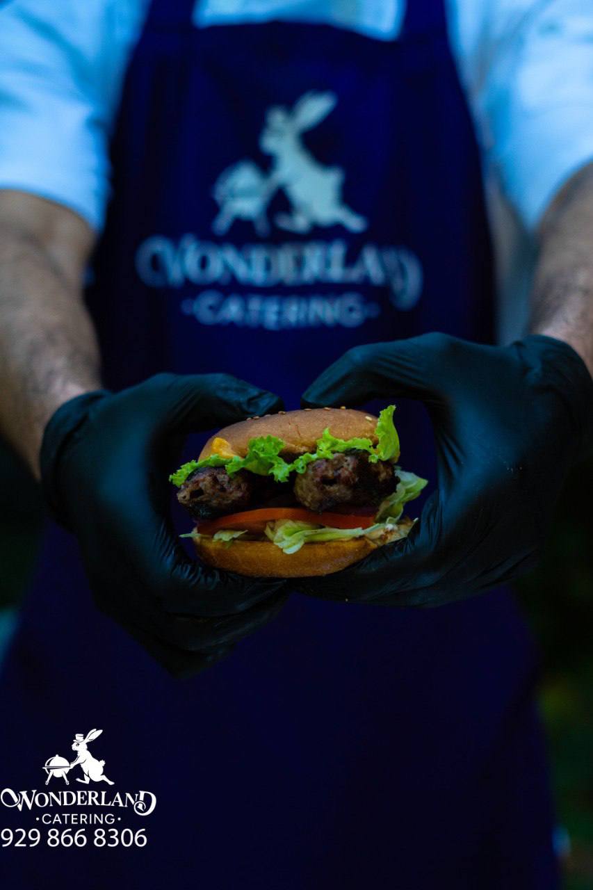 Fresh slider held ready to serve